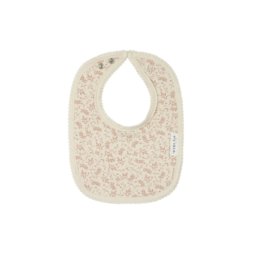 Ely’s & Co. Loom Vine Collection Ivory/Pink Bib